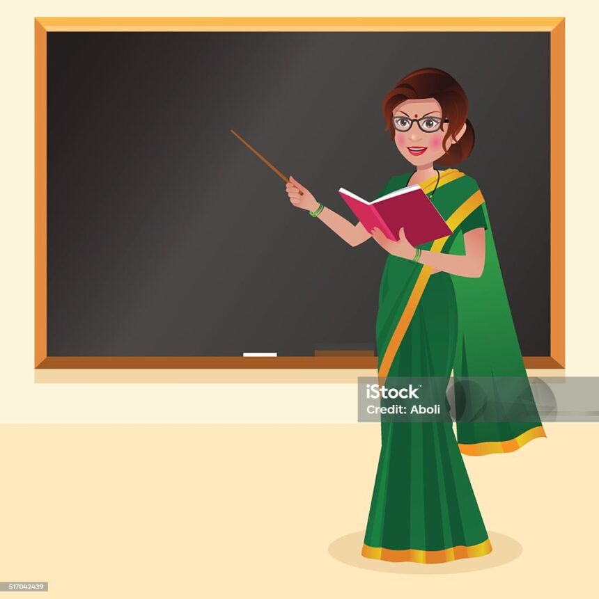 Indian teacher with reading glasses in front of blackboard with book and stick M MARIA AROCKIA PRABHA B.A, D.El.Ed